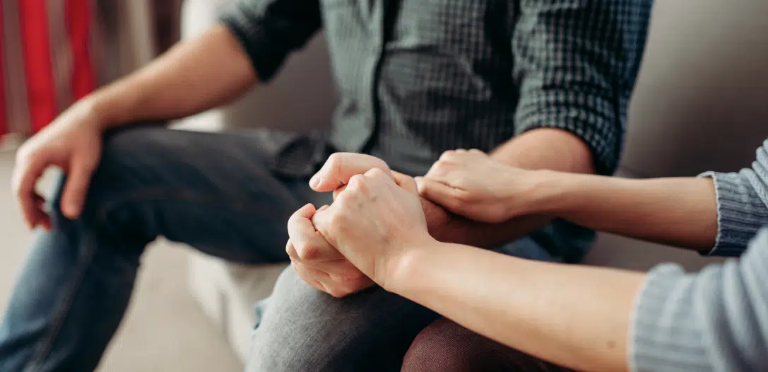 couple-hold-hands-family-psychology-support-2021-08-26-16-26-29-utc-1